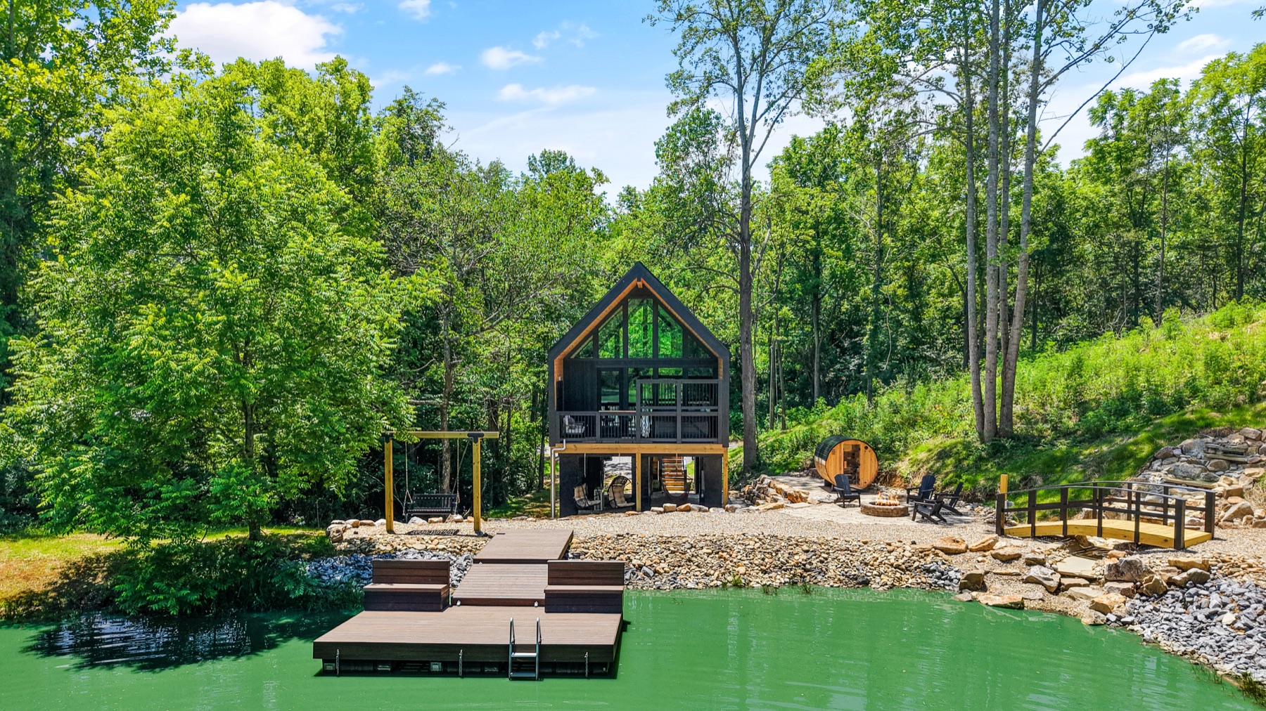 Completed one-bedroom vacation home with pond, outdoor amenities, and landscaped grounds